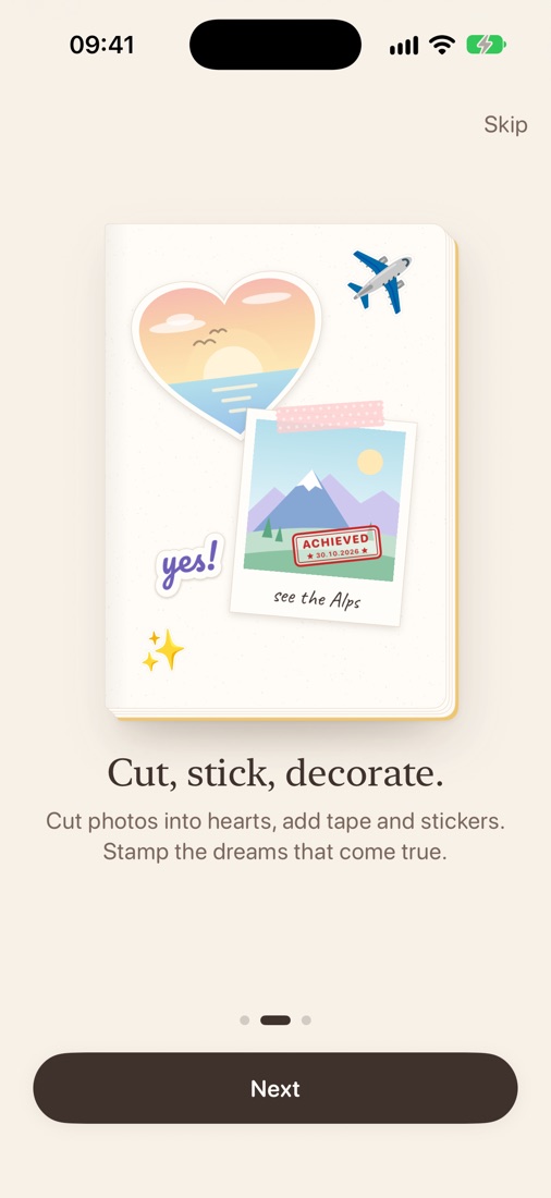 A page with a heart-shaped photo, a polaroid, washi tape and stickers